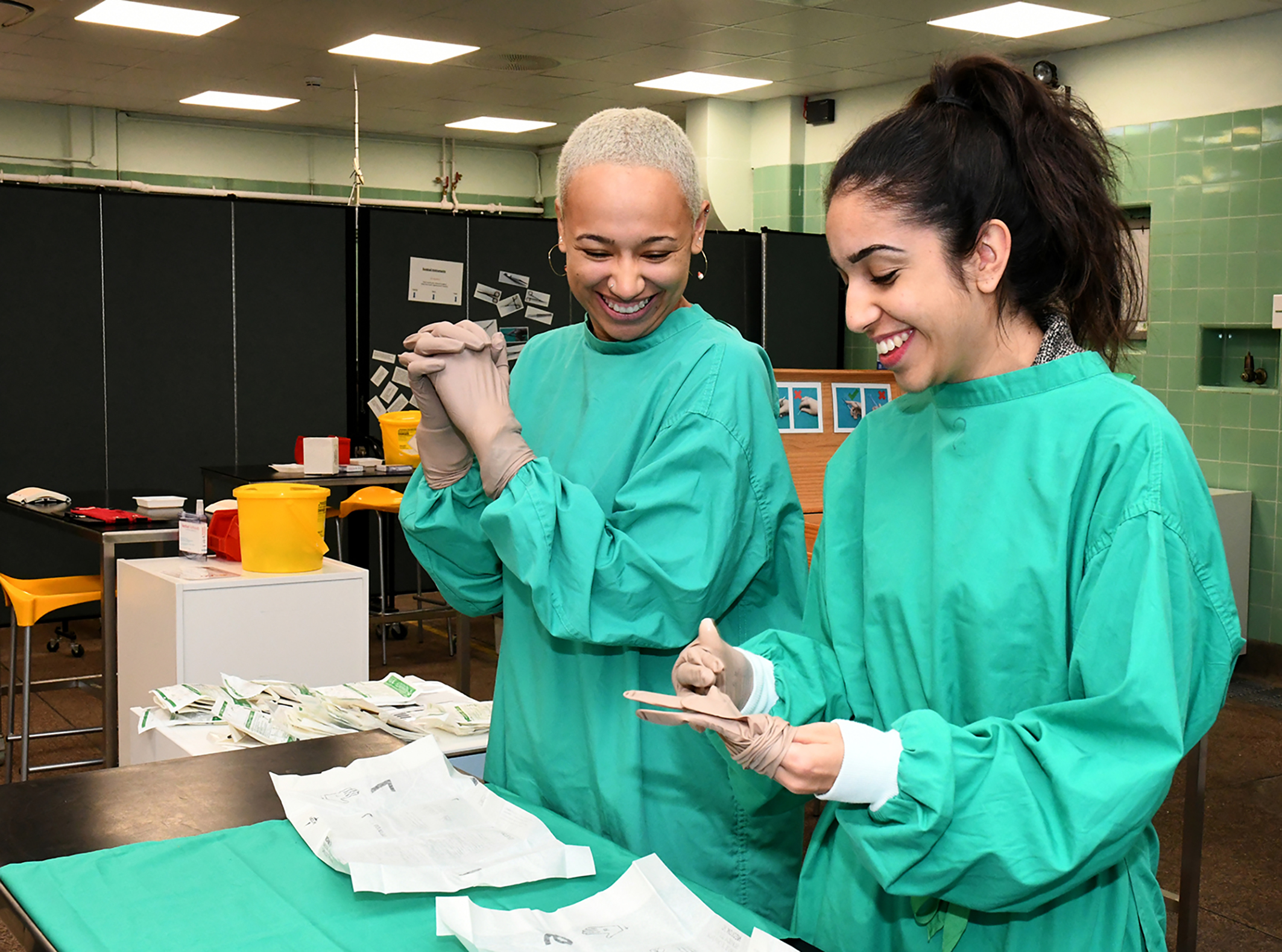 Image of 2 Female Vet students in clinical skills lab